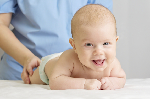 Doctor with little baby